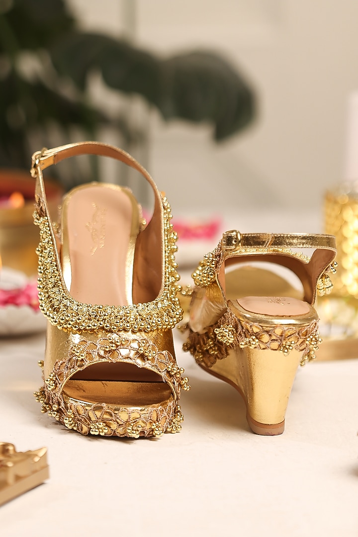 Gold Leatherette White Stone Embroidered Wedges by 5 Elements at Pernia's Pop Up Shop
