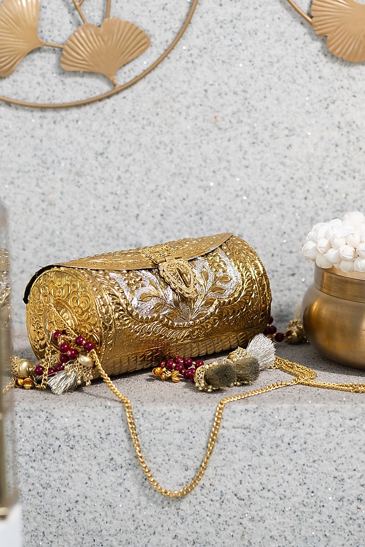 Gold Metal Motifs Embellished Clutch by 5 Elements at Pernia's Pop Up Shop
