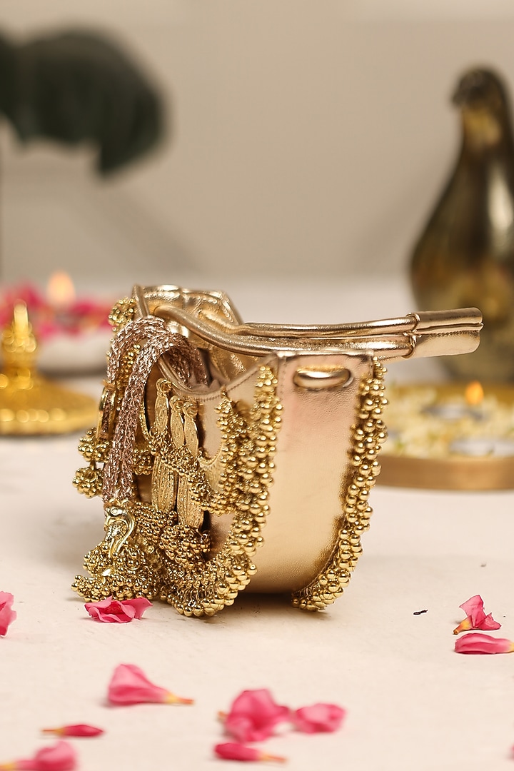 Gold PU Coin Embellished Handbag by 5 Elements at Pernia's Pop Up Shop