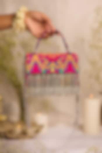 Purple Jacquard Tassels Embellished Textured Handbag by 5 Elements at Pernia's Pop Up Shop