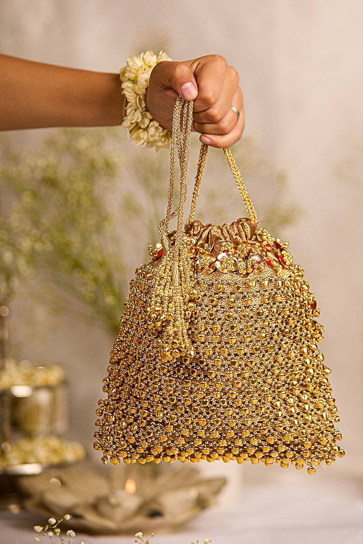 Golden Brocade Ghungroo Embellished Potli Bag by 5 Elements at Pernia's Pop Up Shop