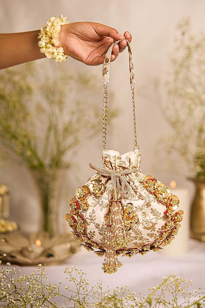 Off-White Silk Dupion Zardosi Embroidered Potli Bag by 5 Elements at Pernia's Pop Up Shop