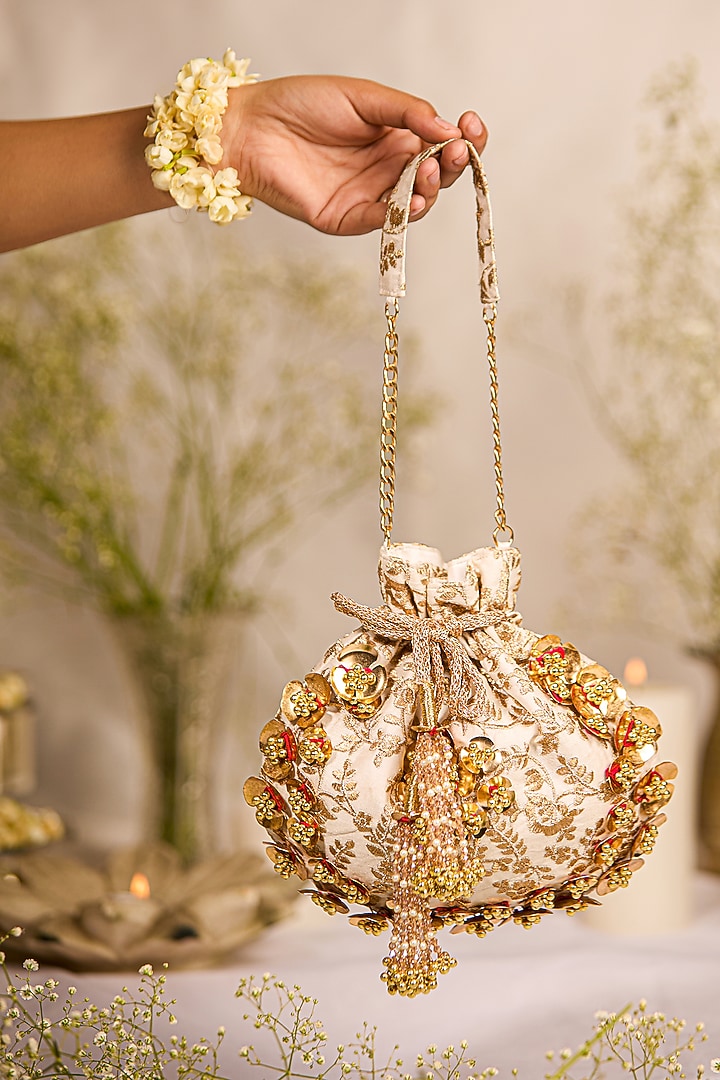 Off-White Silk Dupion Zardosi Embroidered Potli Bag by 5 Elements at Pernia's Pop Up Shop