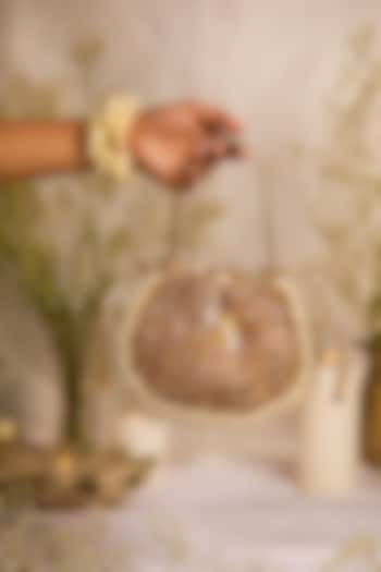 Golden Faux Leather Beads Work Potli Bag by 5 Elements at Pernia's Pop Up Shop