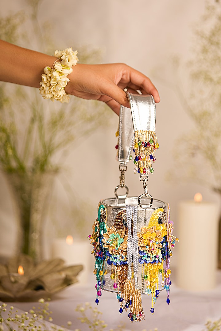 Silver Faux Leather Parrot Motif Cylindrical Potli Bag by 5 Elements at Pernia's Pop Up Shop