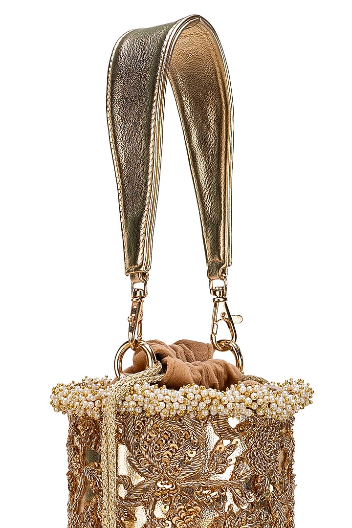 Golden Faux Leather Tasseled Cylindrical Potli Bag by 5 Elements at Pernia's Pop Up Shop