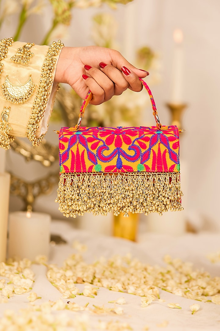 Mustard Jacquard Tassels Embroidered Handbag by 5 Elements at Pernia's Pop Up Shop