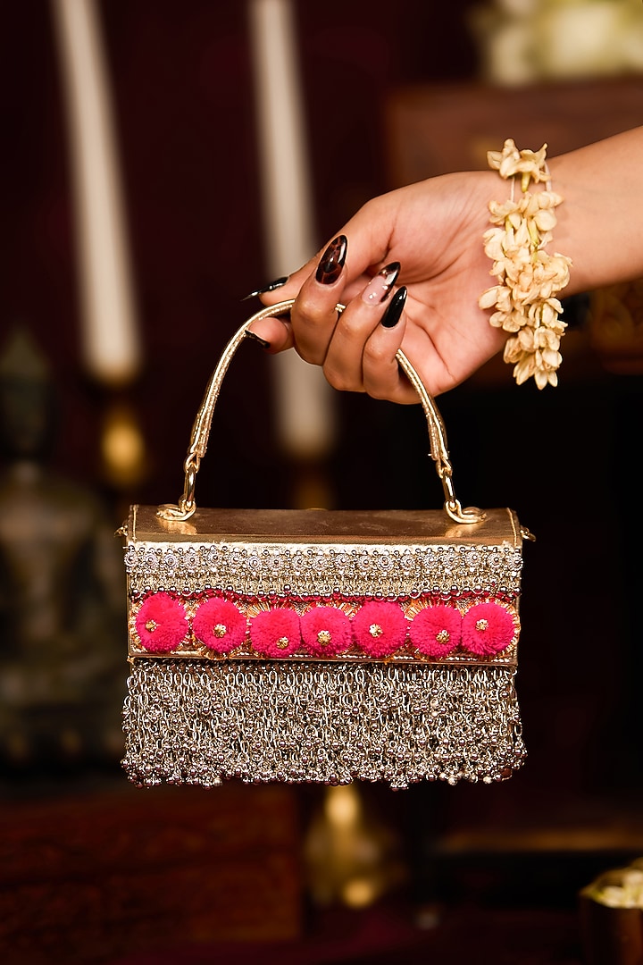 Gold Faux Leather Pom-Poms Embellished Handbag by 5 Elements at Pernia's Pop Up Shop