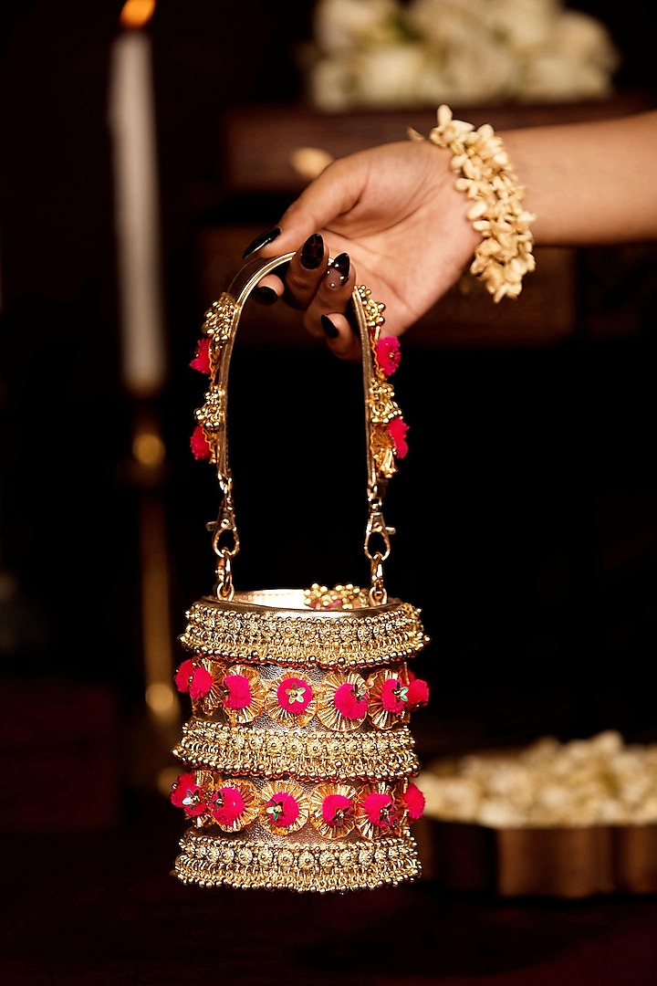 Gold Faux Leather Pink Pom-Poms Rectangular Handbag by 5 Elements at Pernia's Pop Up Shop