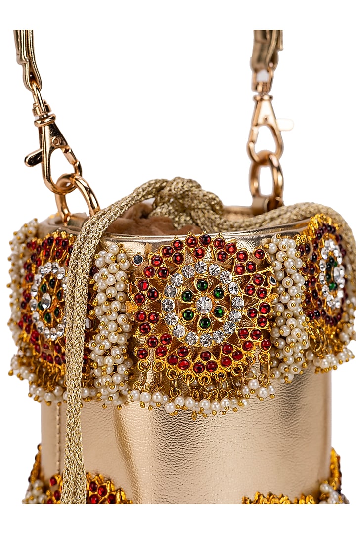 Gold Faux Leather Circular Motif Bucket Handbag by 5 Elements at Pernia's Pop Up Shop