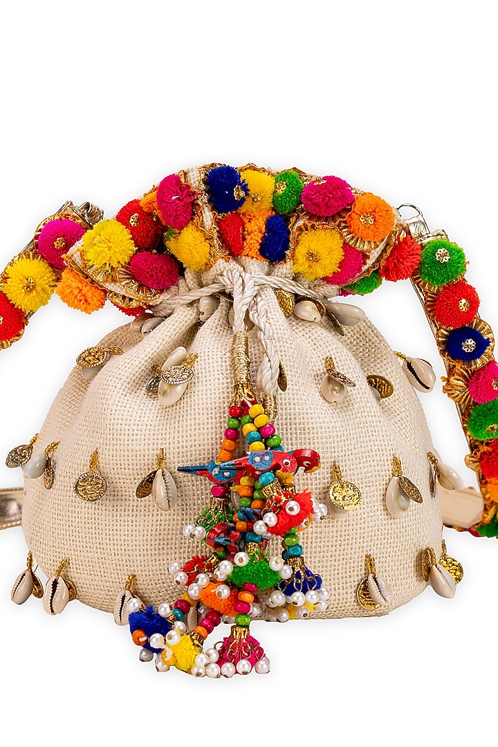 Off-White Jute Pom-Pom Embellished Potli Bag by 5 Elements at Pernia's Pop Up Shop