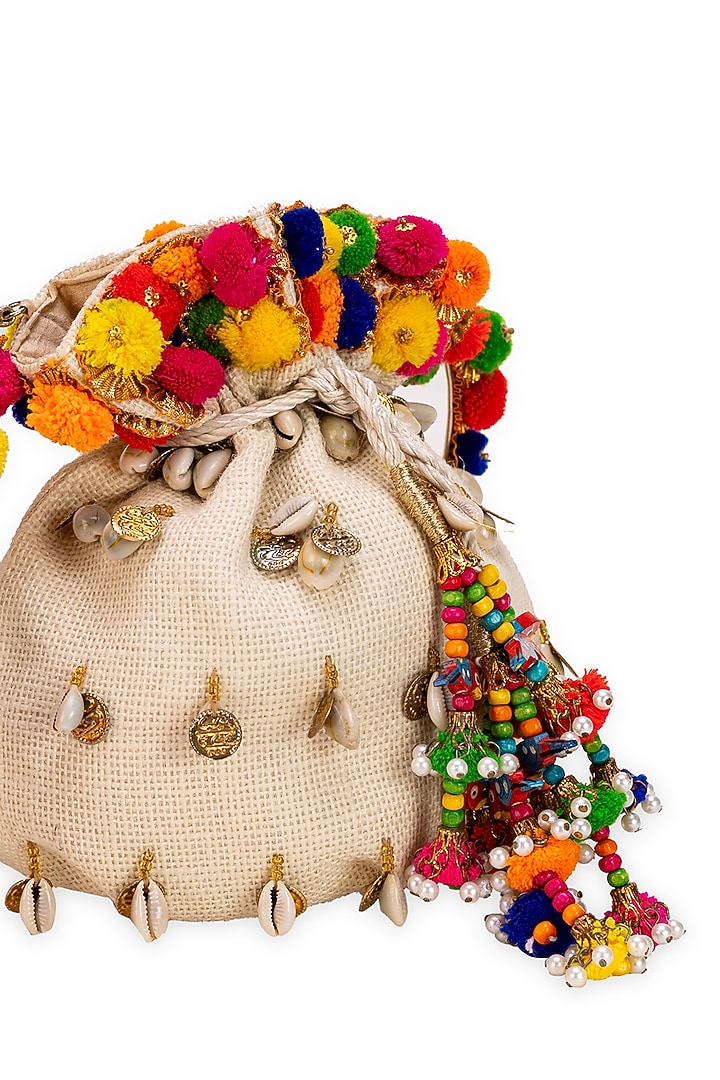 Off-White Jute Pom-Pom Embellished Potli Bag by 5 Elements at Pernia's Pop Up Shop