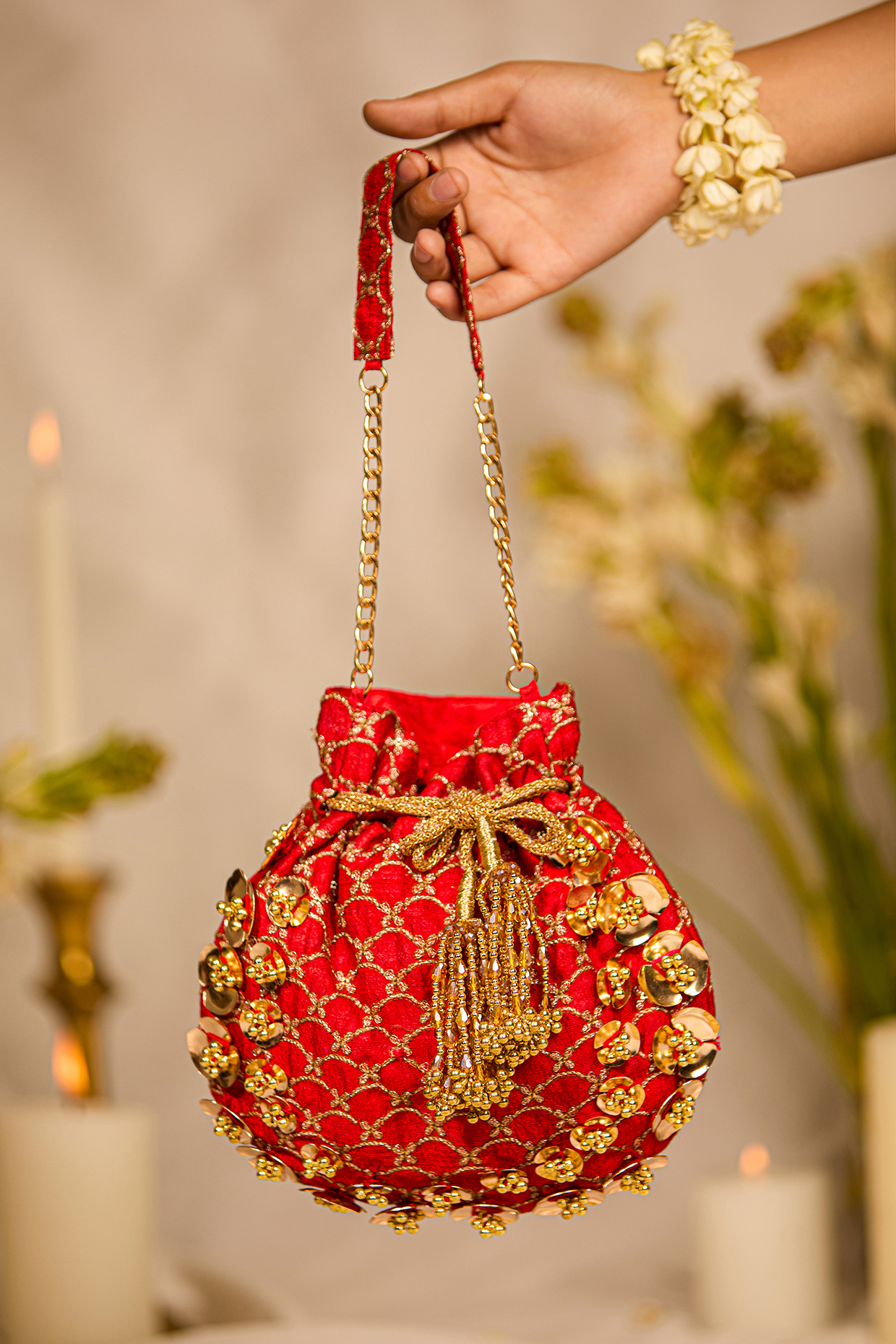 Red Cotton Motif Embellished Potli Bag by 5 Elements at Pernia's Pop Up Shop