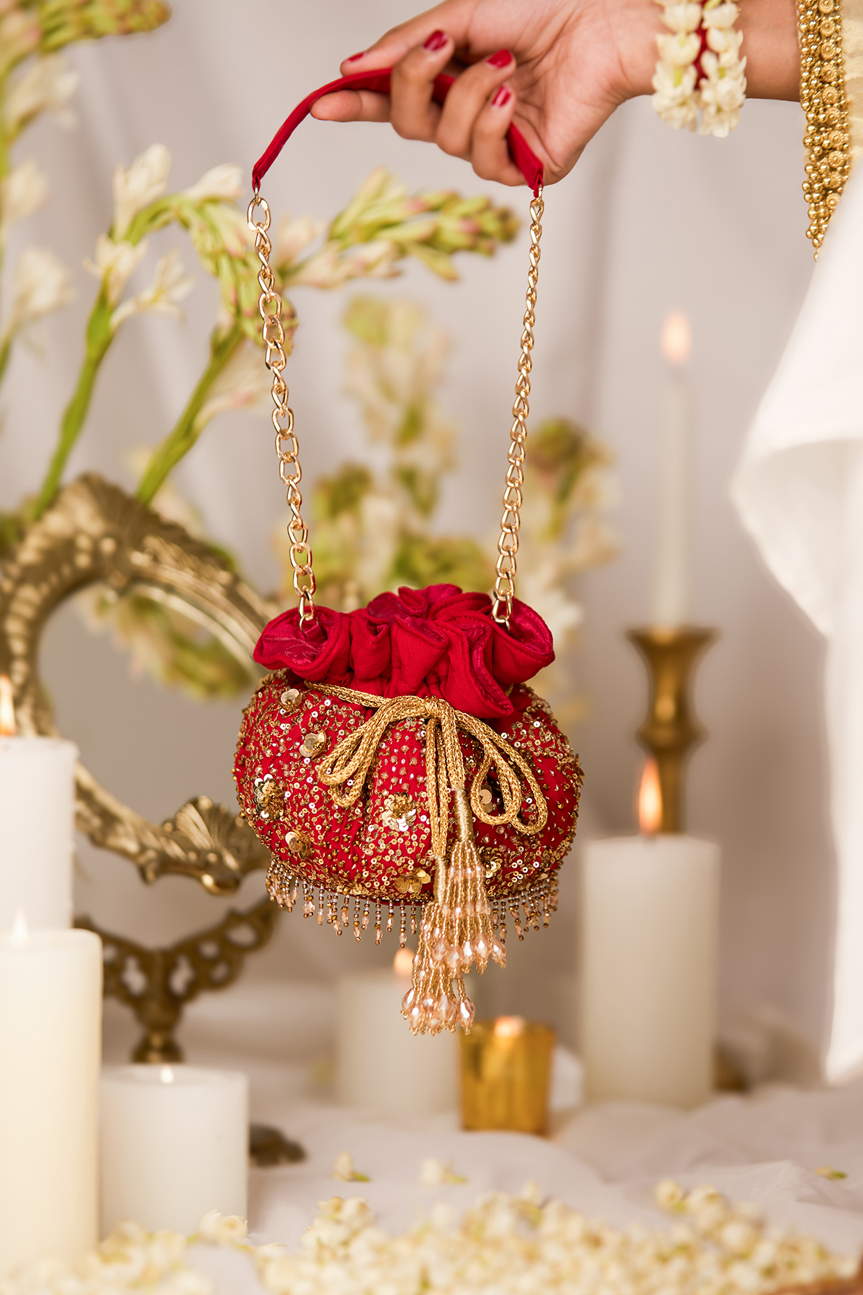 Red Cotton Sequins Embellished Potli Bag by 5 Elements at Pernia's Pop Up Shop