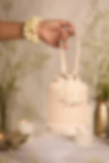 Off-White Jute Seashell Embellished Cylindrical Potli Bag by 5 Elements at Pernia's Pop Up Shop
