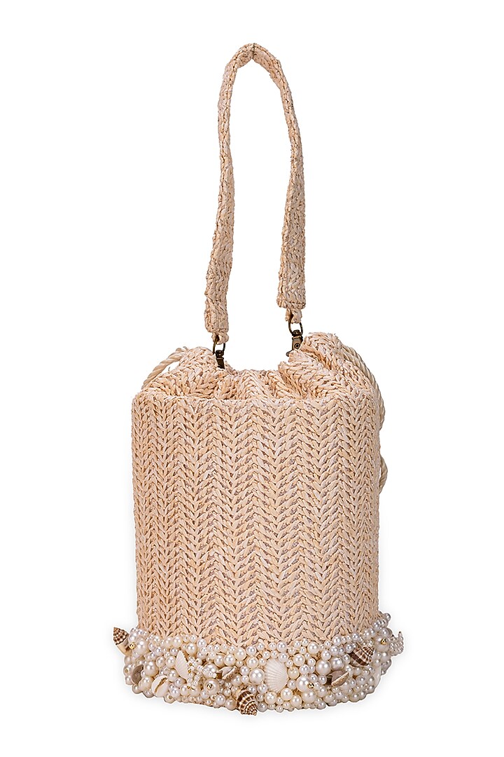 Off-White Jute Seashell Embellished Cylindrical Potli Bag by 5 Elements at Pernia's Pop Up Shop