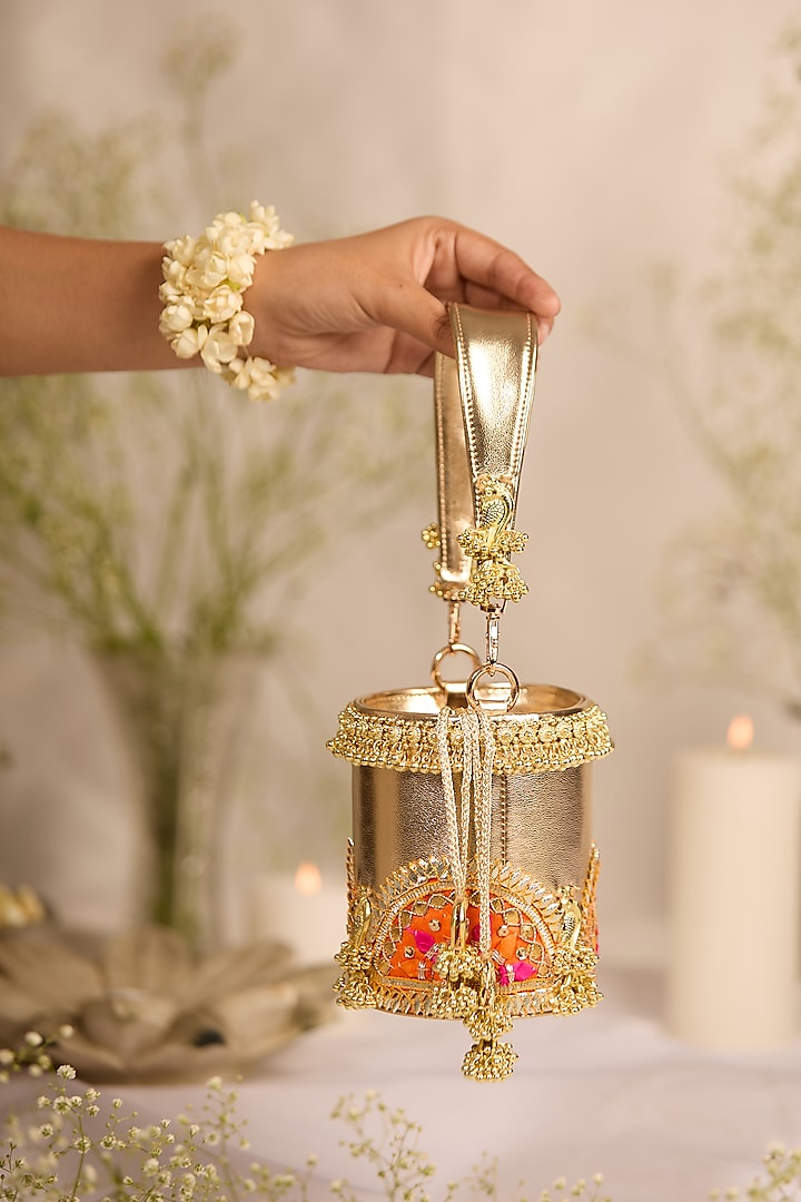 Gold Jute Gota-Patti Embellished Cylindrical Potli Bag by 5 Elements at Pernia's Pop Up Shop