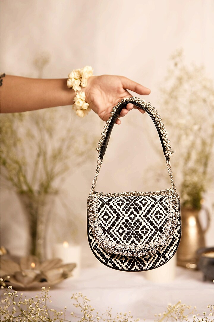 Black Jacquard Geometric Embroidered Circular Handbag by 5 Elements at Pernia's Pop Up Shop