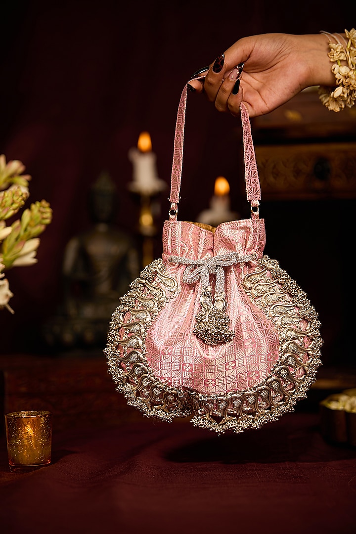 Pink Brocade Tassels Embellished Potli Bag by 5 Elements at Pernia's Pop Up Shop