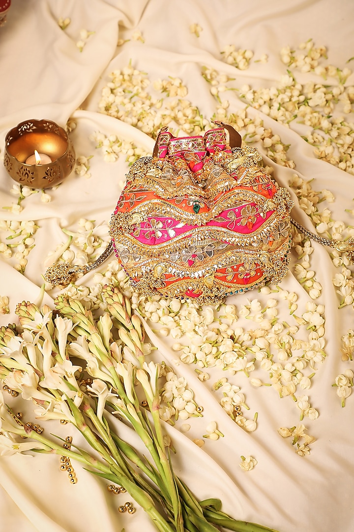 Orange Silk Sequins Embroidered Potli by 5 Elements at Pernia's Pop Up Shop