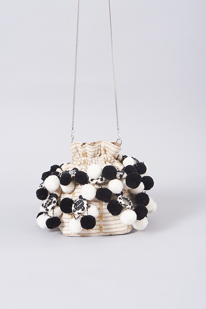 White & Black Potli With Pom Poms by 5 Elements at Pernia's Pop Up Shop