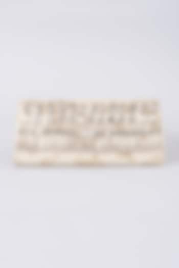 Off-White Ghungroo Embellished Clutch by 5 Elements at Pernia's Pop Up Shop