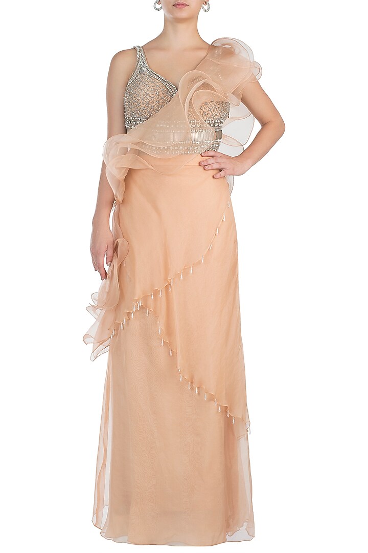 Nude embroidered ruffle skirt saree with blouse available only at Pernia's Pop Up Shop.