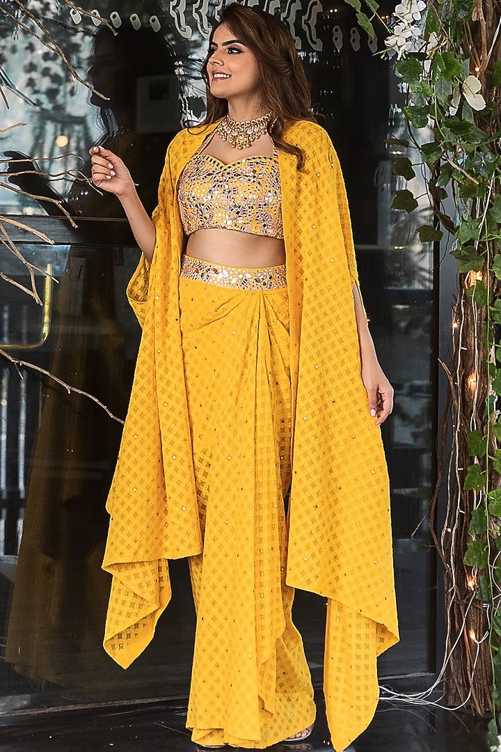 Mustard Yellow Draped Skirt Set With Cape by Nitara Dhanraj Label at Pernia's Pop Up Shop