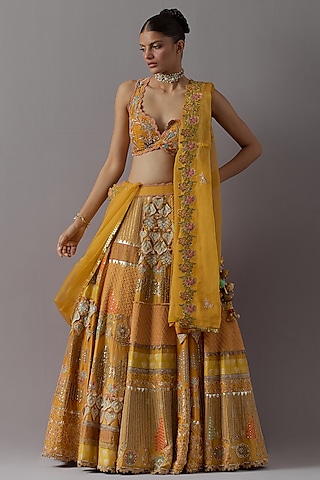 Mustard Silk Brocade & Banarasi Lehenga Set by aum ashima & asit