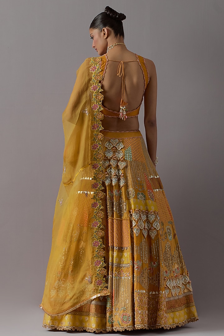Mustard Silk Brocade & Banarasi Bridal Lehenga Set by aum ashima & asit at Pernia's Pop Up Shop