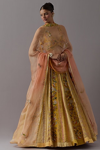 Mustard Raw Silk & Brocade Lehenga Set by aum ashima & asit
