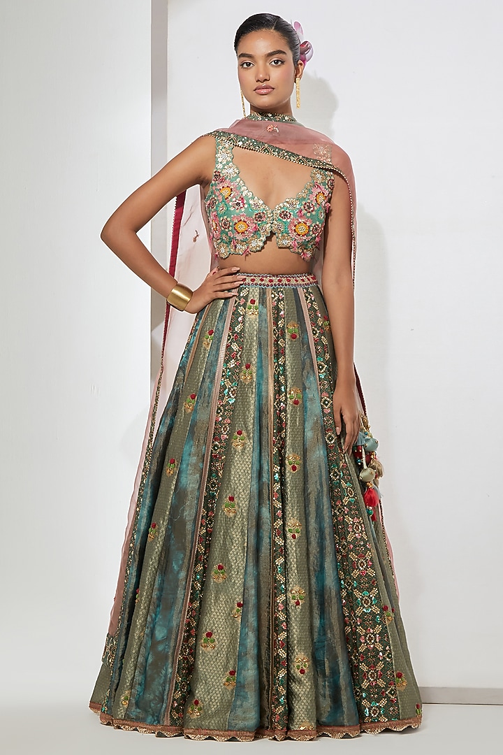 Turquoise Tissue Silk Floral Embroidered Bridal Lehenga Set by aum ashima & asit at Pernia's Pop Up Shop