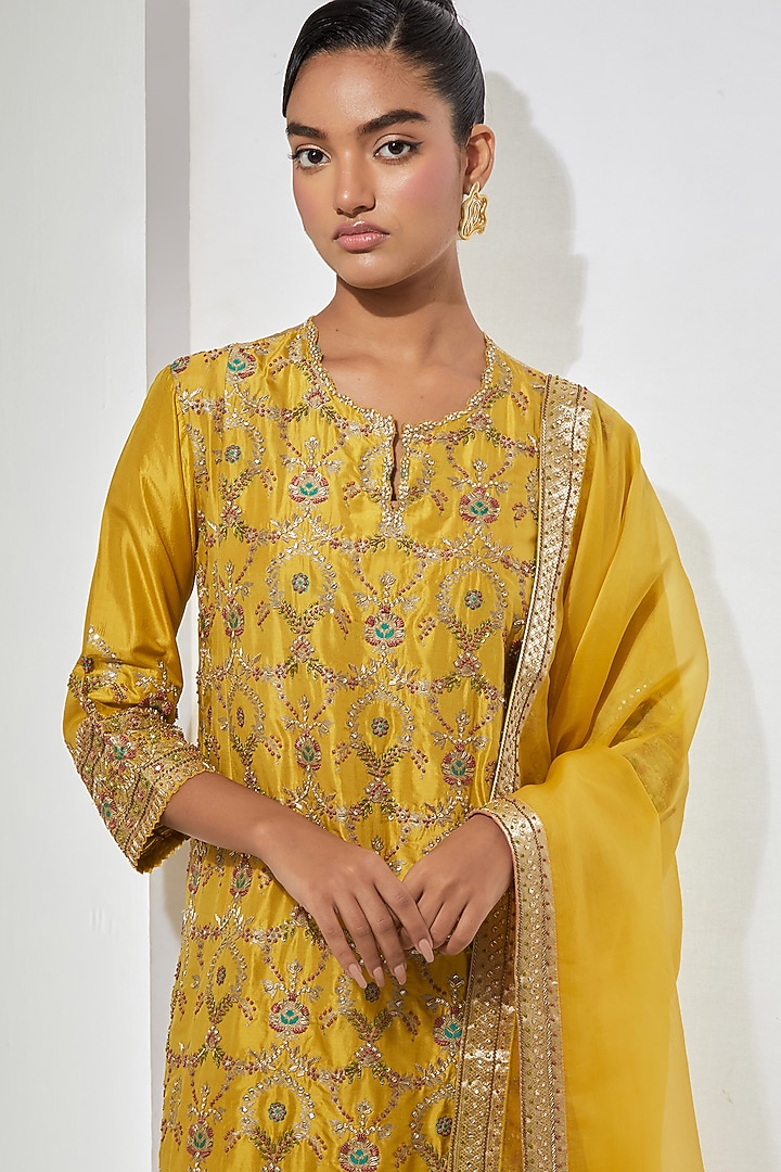 Mustard Silk Banarasi Brocade Floral Embroidered Kurta Set by aum ashima & asit at Pernia's Pop Up Shop
