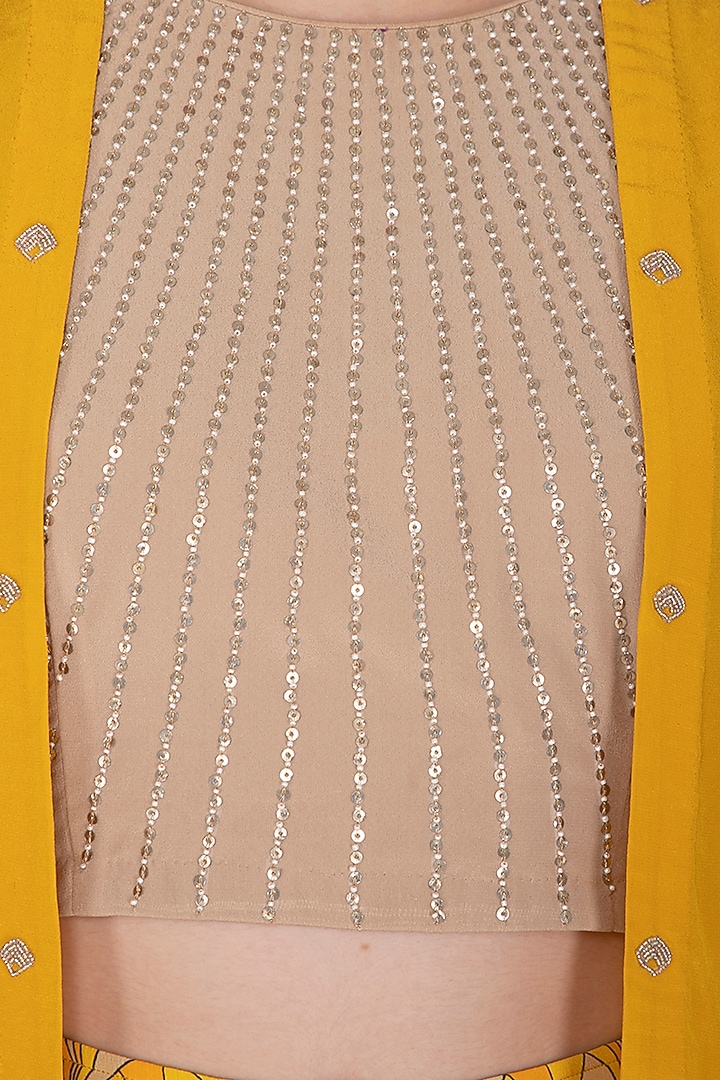 Marigold Yellow Embroidered Cape With Blouse & Printed Pants by Aashna Behl at Pernia's Pop Up Shop