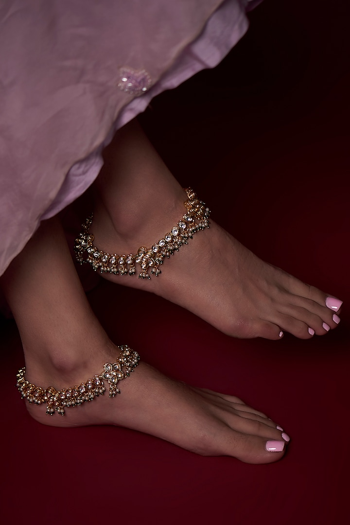 Gold Finish Kundan Polki & Green Beaded Anklets (Set Of 2) by AAKARSHA BY AJAY