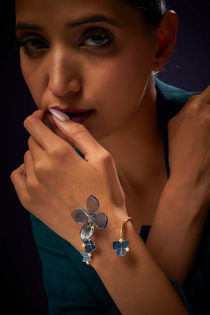 Gold Finish Blue Floral Bracelet by Aadikara