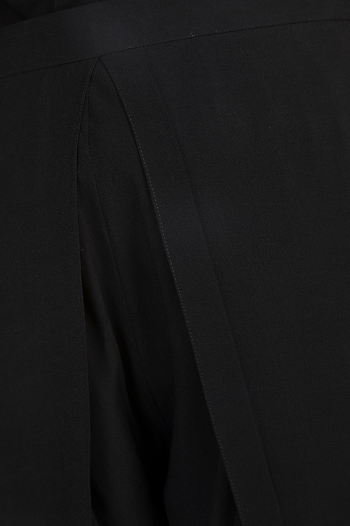 Black Embroidered Overlap Pants by Aarti Mahtani at Pernia's Pop Up Shop