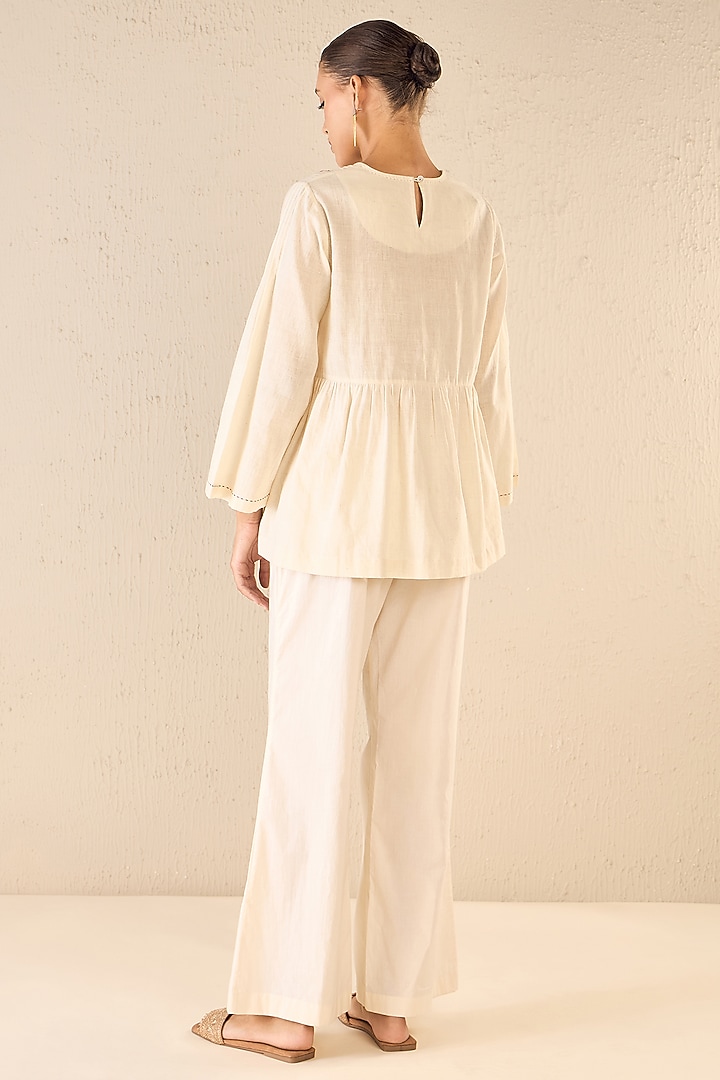 Ivory Cotton Floral Embroidered Co-Ord Set by Shivani Bhargava at Pernia's Pop Up Shop