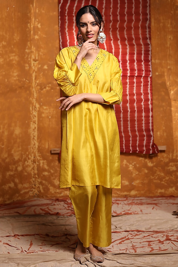 Mustard Pure Natural Silk Tribal Motif Hand Embroidered Kurta Set by Shivani Bhargava at Pernia's Pop Up Shop