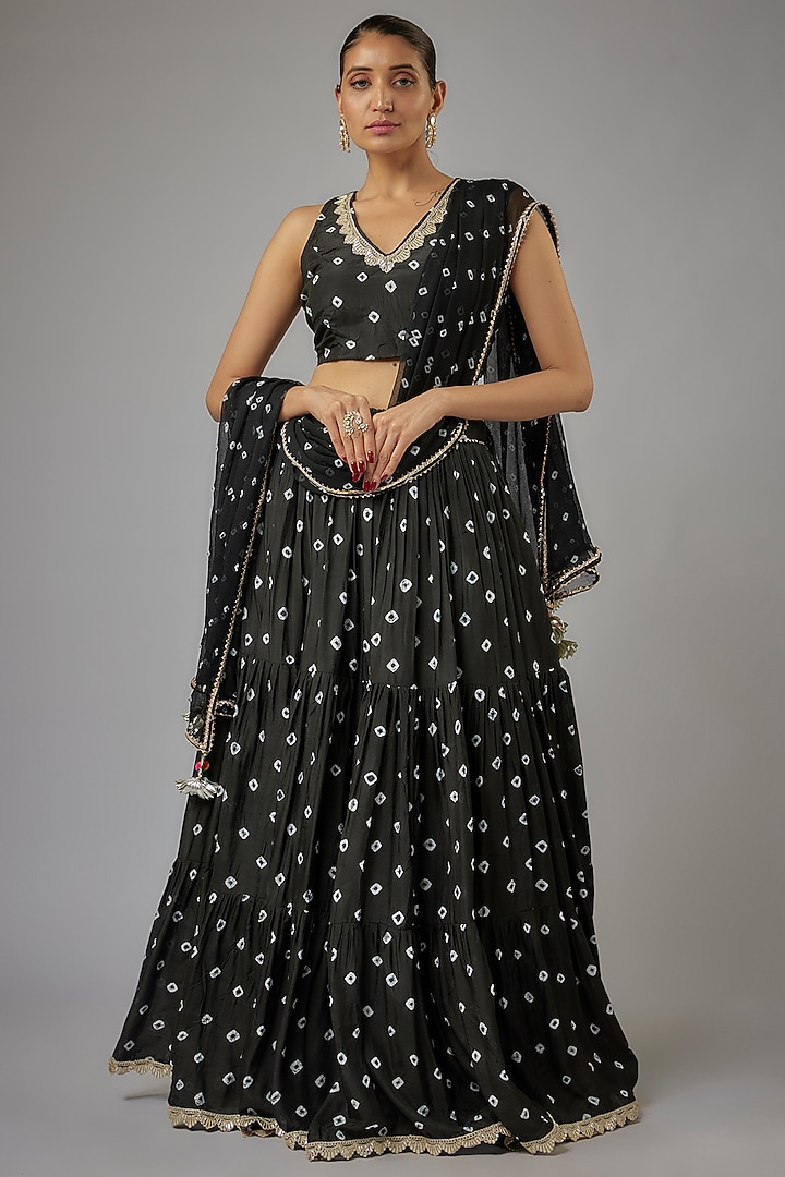Black Muslin Hand-Tied Bandhej Printed Lehenga Set by Aarnya by Richa at Pernia's Pop Up Shop