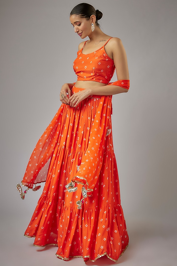 Orange Muslin Hand-Tied Bandhej Printed Lehenga Set by Aarnya by Richa at Pernia's Pop Up Shop
