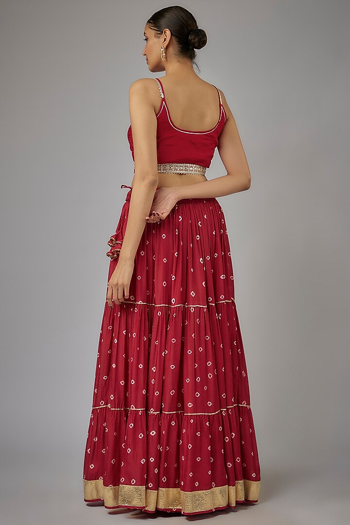 Maroon Muslin Hand-Tied Bandhej Printed Lehenga Set by Aarnya by Richa at Pernia's Pop Up Shop