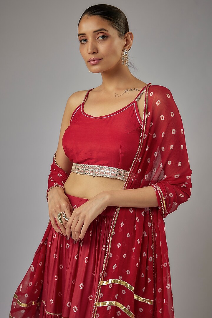 Maroon Muslin Hand-Tied Bandhej Printed Lehenga Set by Aarnya by Richa at Pernia's Pop Up Shop