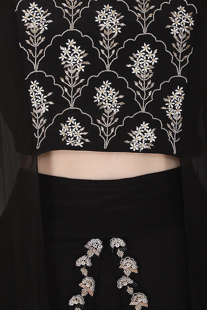 Black embroidered fringes cape blouse with dhoti pants available only at Pernia's Pop Up Shop.