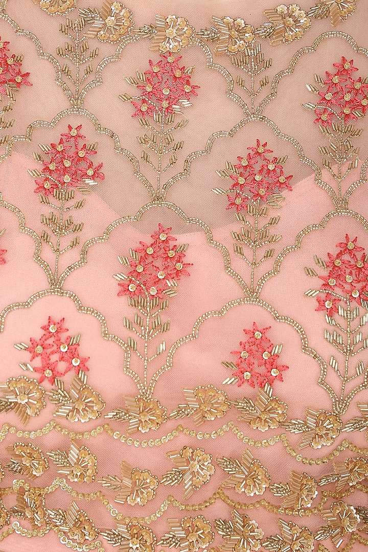 Peach embroidered blouse with tiered ruffles lehenga skirt available only at Pernia's Pop Up Shop.