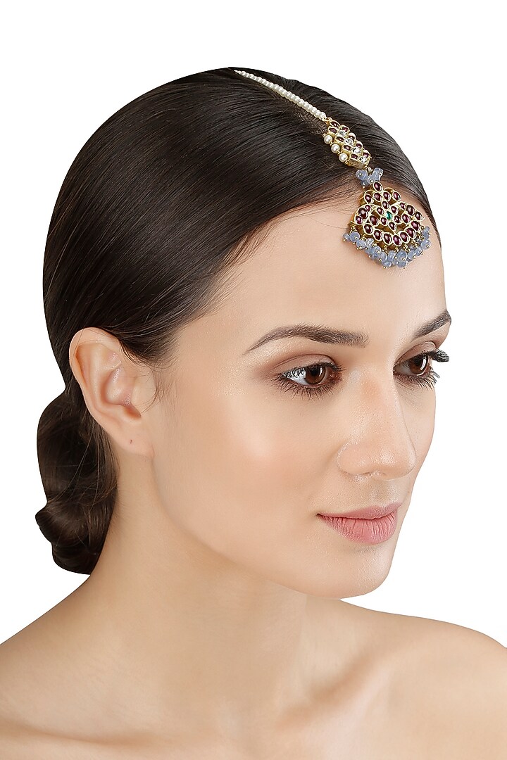 Aaharya presents Gold leafing kemp stone and saphhire crescent maang tikka available only at Pernia's Pop Up Shop.