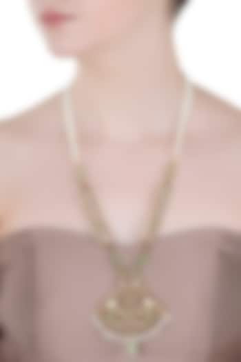 Gold plated red kemp stones and quartz embellished necklace available only at Pernia's Pop Up Shop.