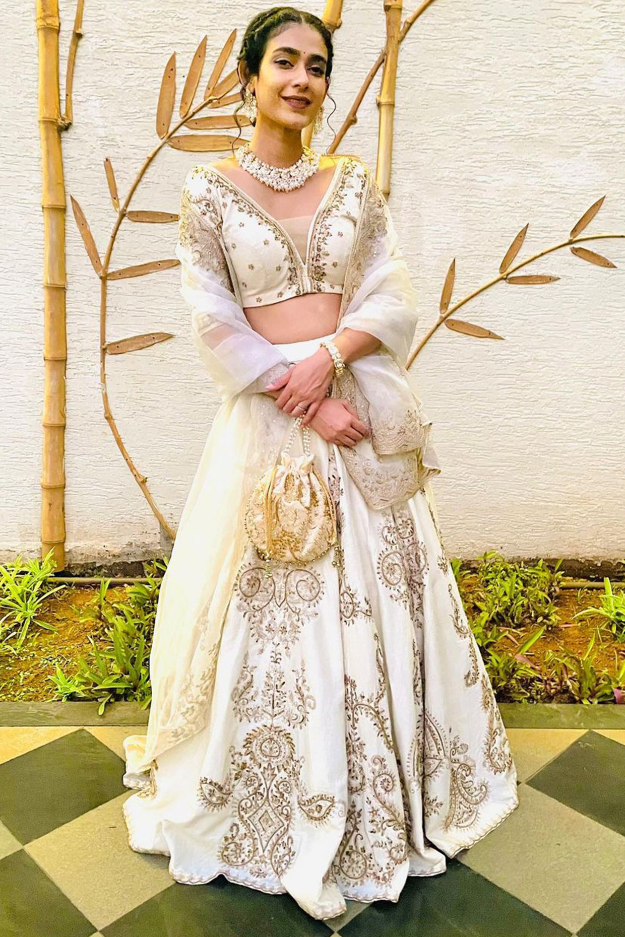 Off White Embroidered Lehenga Set by Megha & Jigar