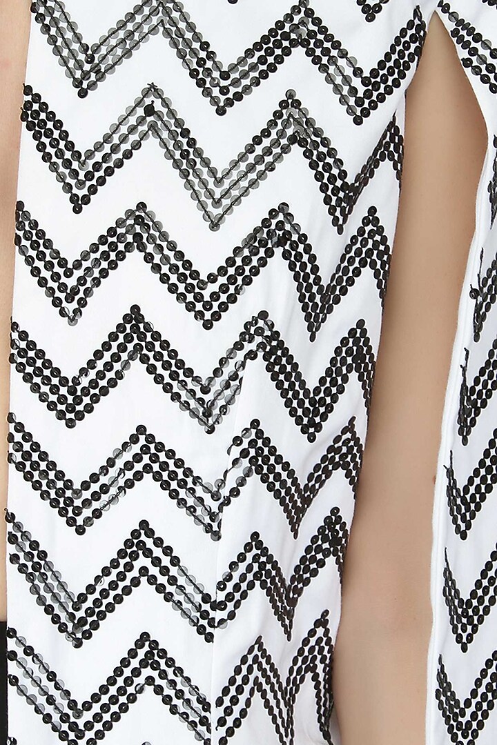 Aawa by Aastha Wadhwa presents White handcrafted chevron pattern cape jacket available only at Pernia's Pop Up Shop