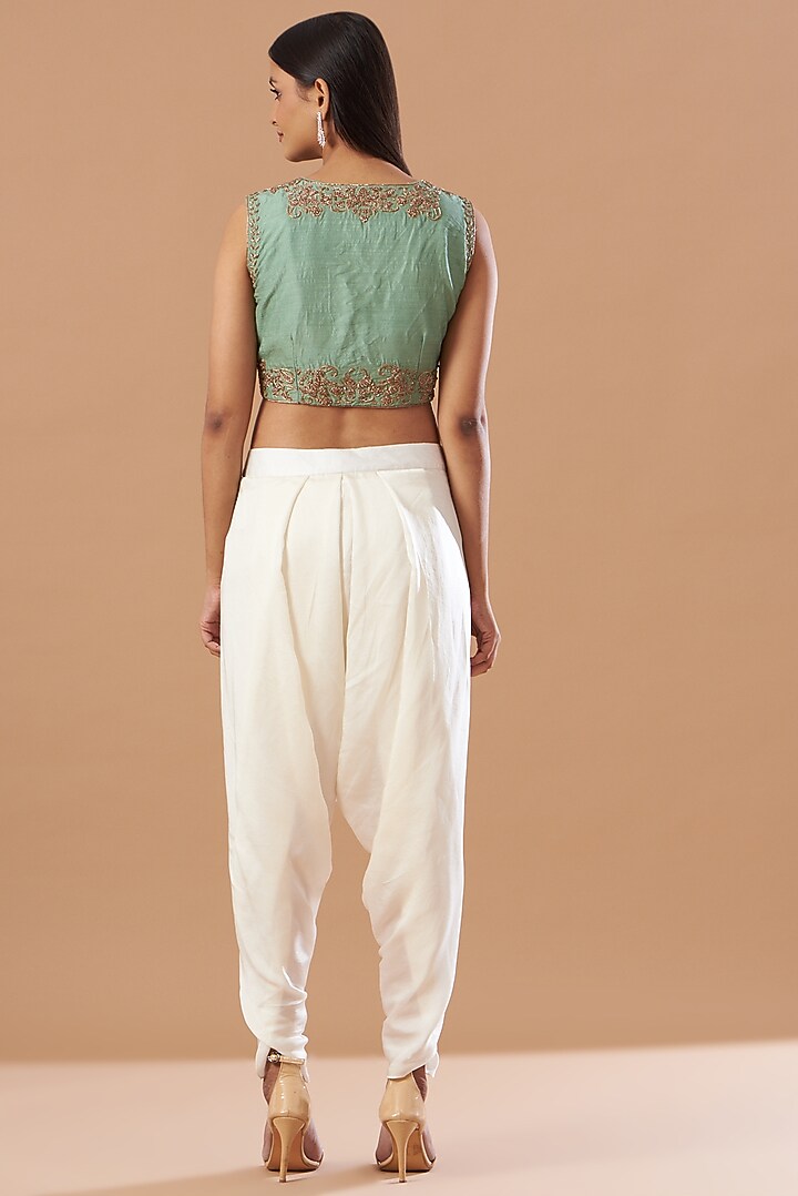 Turquoise Draped Dhoti Set With Embroidered Jacket by Aashima Behl at Pernia's Pop Up Shop